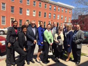 State officials toured East Baltimore in April to observe EBDI's progress.