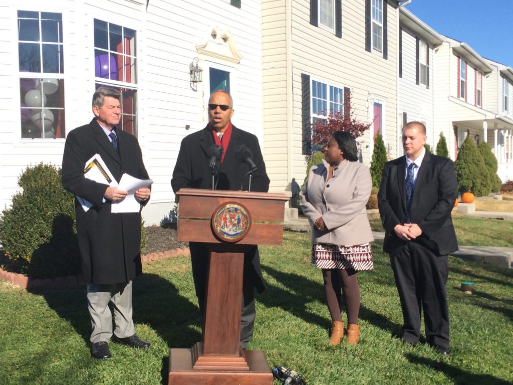 Maryland Department of Housing and Community Development Secretary Kenneth Holt, Lt. Governor Boyd Rutherford, new homeowner Ms. Jasmine Townsel and her fiancé, Brian, celebrate the first purchase under the Maryland SmartBuy program.