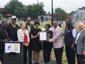 Assistant Secretary Carol Gilbert (third from left) celebrates the grand reopening of Ambrose Kennedy Park. (Photo courtesy of Baltimore Mayor's Office)