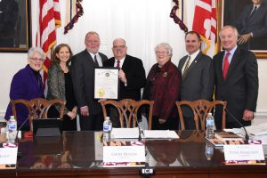Governor Larry Hogan awards Somers Cove Marina Executive Director Tom Schisler with a Customer Service Award