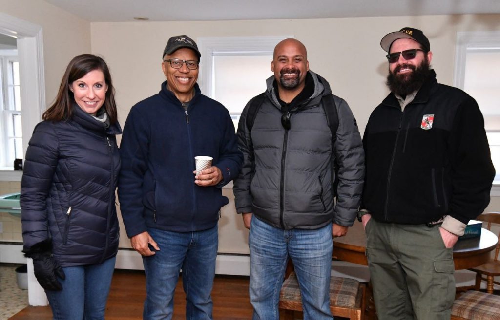 Photo of Lt. Governor Boyd Rutherford, Secretary Jeannie Haddaway-Riccio, and Deputy Secretary Charles Glass visiting Patuxent River State Park with Ranger Shea Neimann