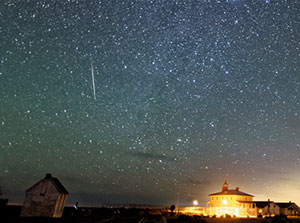 Shooting star over Point Lookout State Park - Photo by Xavier-Prines