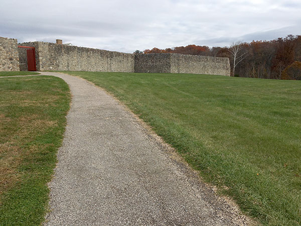 Fall trees line the perimeter around the fort