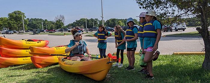 Girls getting kayak instruction