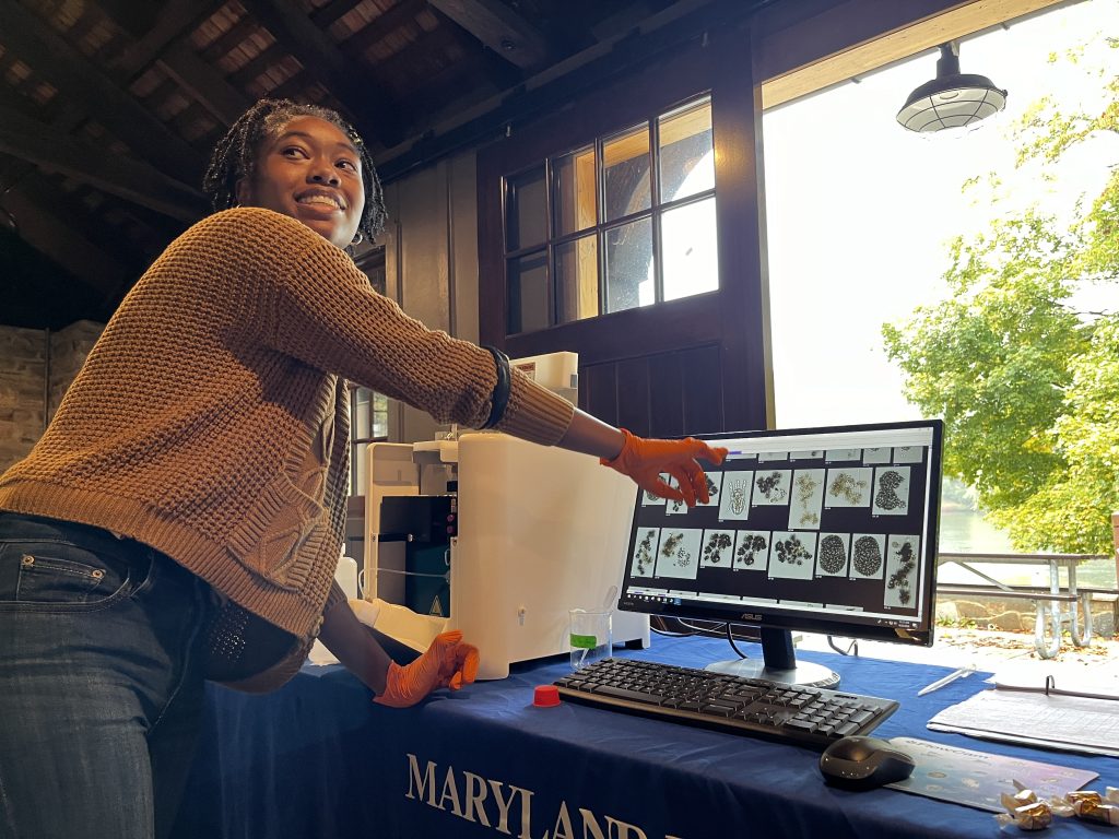 DNR staff member demonstrates the FloCam during DNR's September Science Week