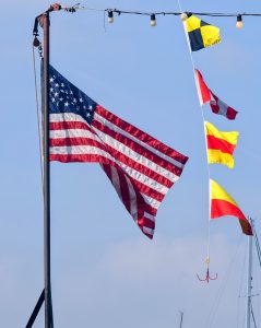American Flag hanging from a boat