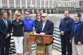 Governor Hogan, Ben Grumbles, and others speaking at the Conowingo dam