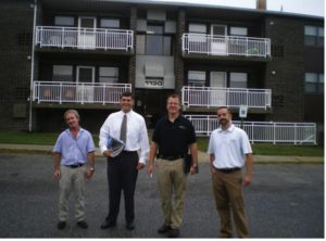Housing Authority of City of Annapolis Project Manager Mark Ford, ACDS Construction Specialist Chris Maruyama, MEA Program Manager Dean Fisher and ACDS Construction Specialist Carson Arnold at the Harbour House Community 