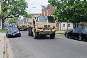 Members of the Maryland National Guard’s 1229th Transportation Company transported goods from Cade Armory to BIGGYS Community Center in Baltimore, Md., May 5, 2015. When the Soldiers arrived, they were helped by some of the residents in the neighborhood. (Photo by Staff Sgt. Michael E. Davis Jr., Maryland National Guard Public Affairs Office)