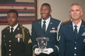 Senior Airman Daniel C. Generette, a member of the Maryland National Guard Honor Guard, received the Honor Guardsman of the Year Award during a ceremony at the 5th Regiment Armory in Baltimore, Md. June 23, 2015. During the ceremony, other Soldiers and Airmen received the 2014 Honor Guardsmen of the Quarter Awards. (Photo by Staff Sgt. Michael E. Davis Jr., Maryland National Guard Public Affairs Office)