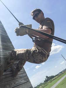 German Army Capt. Thomas Werft learns to repel with Headquarters and Headquarters Detachment of the 115th Military Police Battalion, Maryland National Guard in Salisbury, Md., June 16, 2015.