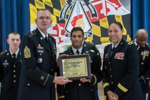 Capt. Alexi Franklin, 32nd Civil Support Team, recieves the award for officer of the year after Maryland's Best Warrior Competition. Presenting the award is Command Sgt. Maj. Thomas Beyard and Maj. Gen. Linda Singh, adjutant general of Maryland. The 2016 Best Warrior Competition takes place at Aberdeen Proving Ground, Edgewood, Md., and Gunpowder Military Reservation, Glen Arm, Md., from March 10-13, 2016.Reservation, Glen Arm, Md., on March 10-13, 2016.