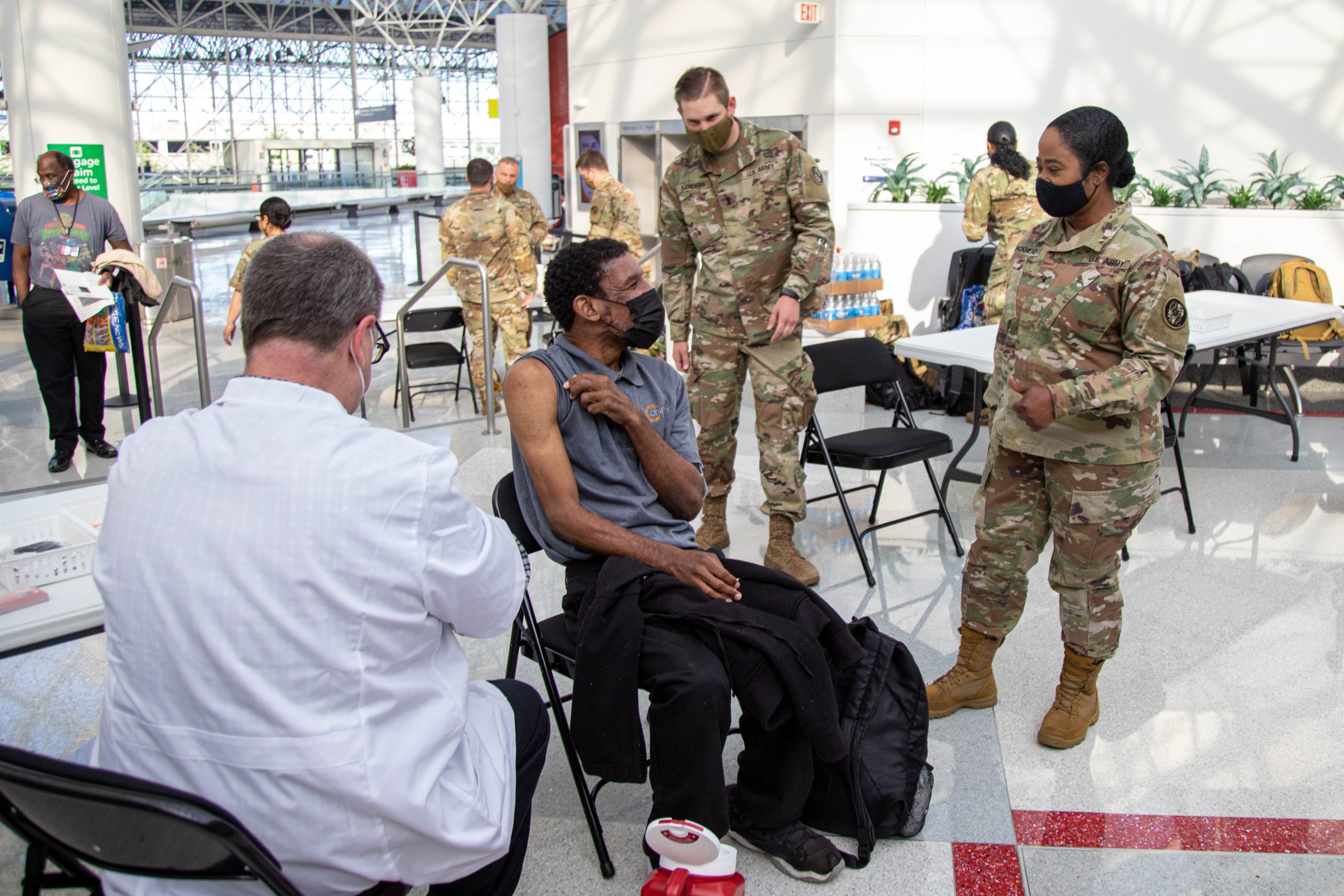 The Bridge Between The Vaccine Equity Task Force vaccinates CHIMES employees at BWI Airport