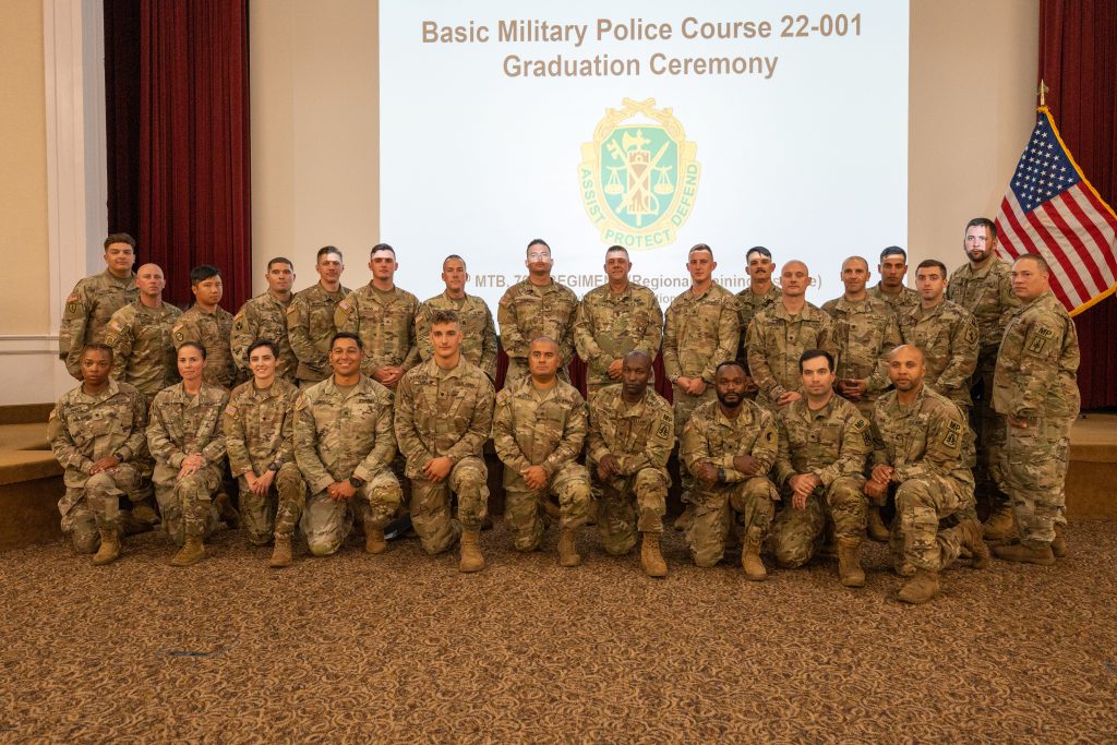 Basic Military Police Course graduates pose for a photo in Edgewood, Md., Sept. 1, 2022. The 70th Regional Training Institute, 2nd Modular Training Battalion trains Soldiers from the Army National Guard, Reserves and Active Duty from all over the country focusing on training Soldiers who will become military police officers and already have a primary military occupational specialty (U.S. Army National Guard photo by Sgt. Tom Lamb)