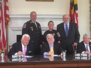 Chief Mike Wilson and Lieutenant Rebecca Labs of the DGS Capitol Police, along with Deputy Secretary Nelson Reichart, at the bill signing for HB 1188.