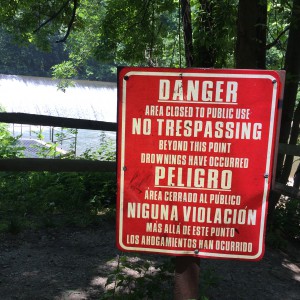 One of the warning signs posted along Bloede Dam 