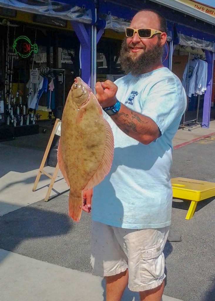 Kevin Twilley with his state record five-pound, two-ounce winter flounder 
