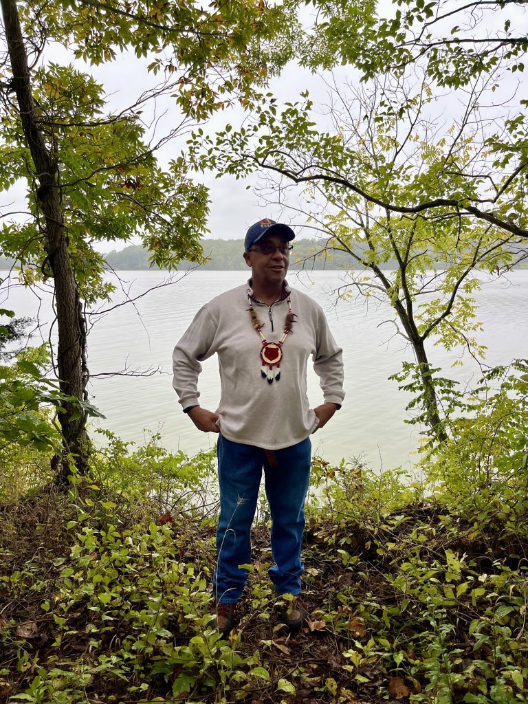 Francis Gray, the tribal chairman of today’s Piscataway Conoy Tribe, stands near the dig site at Chapel Point State Park on the banks of the Port Tobacco River. Credit: A.J. Metcalf/ Maryland DNR